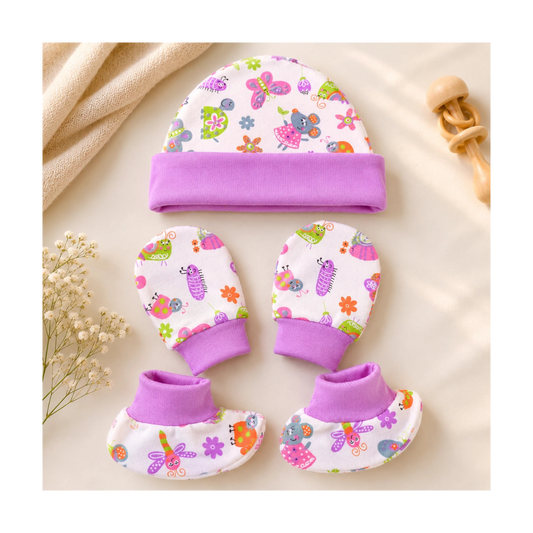 Baby hat, mittens, and booties set with colorful patterns on a beige background